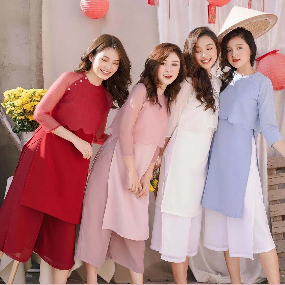 Áo dài cách tân mặc với quần gì cho nàng rực rỡ xuống phố