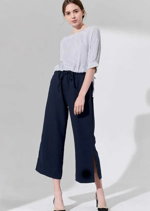 Cách kết hợp quần lửng ống rộng với áo và giày theo xu hướng thời trang trendy