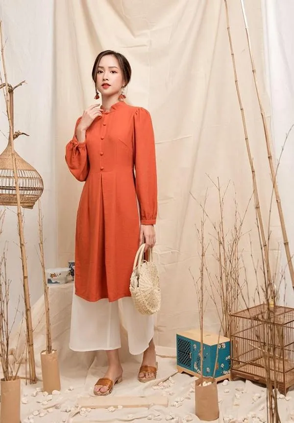 Áo dài cách tân mặc với quần gì cho nàng rực rỡ xuống phố