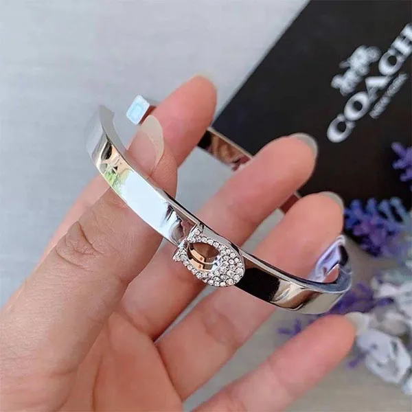 Vòng Đeo Tay Coach Pave Signature Hinged Bangle 91428 Màu Bạc - Trang sức - Vua Hàng Hiệu