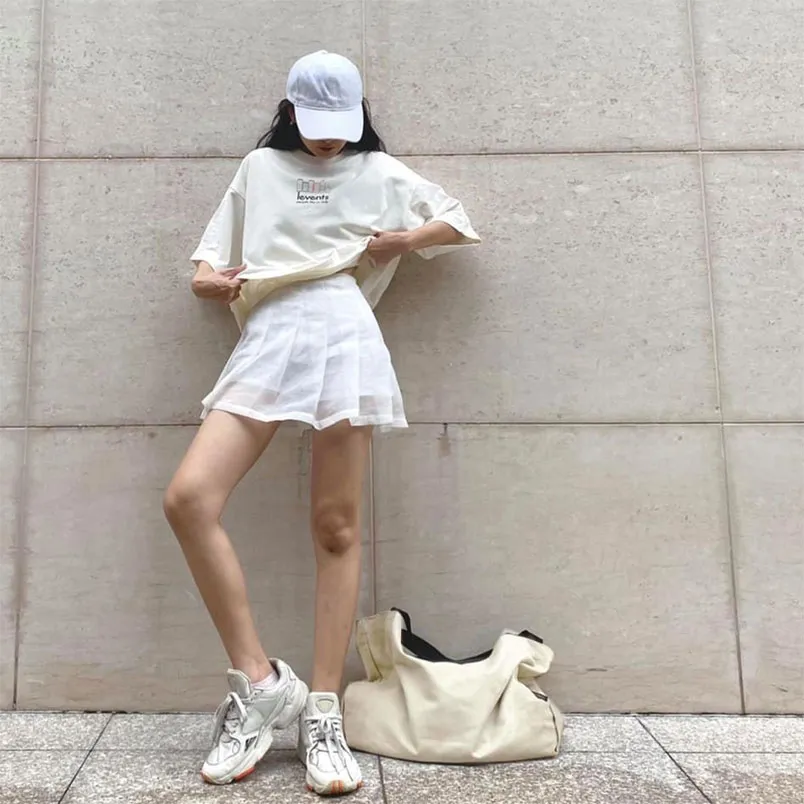 Chân váy trắng mặc với áo màu gì? 15 cách phối đồ vô cùng đẹp