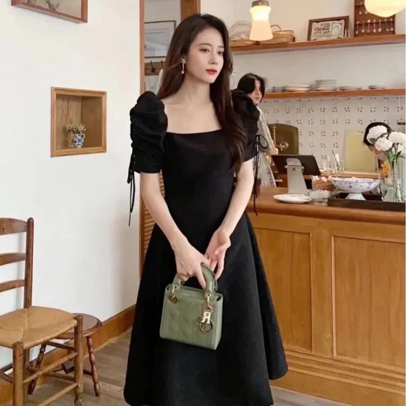 Mặc đầm đen phối túi màu gì đẹp và hợp mốt? - 8