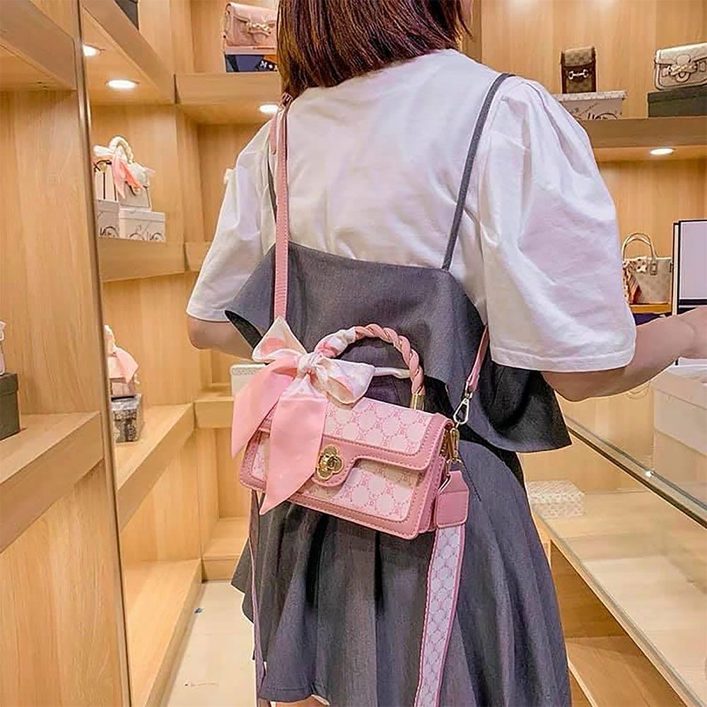 Mẫu túi nơ thống trị xu hướng thời trang, được nhiều sao Hàn mê mẩn - 1