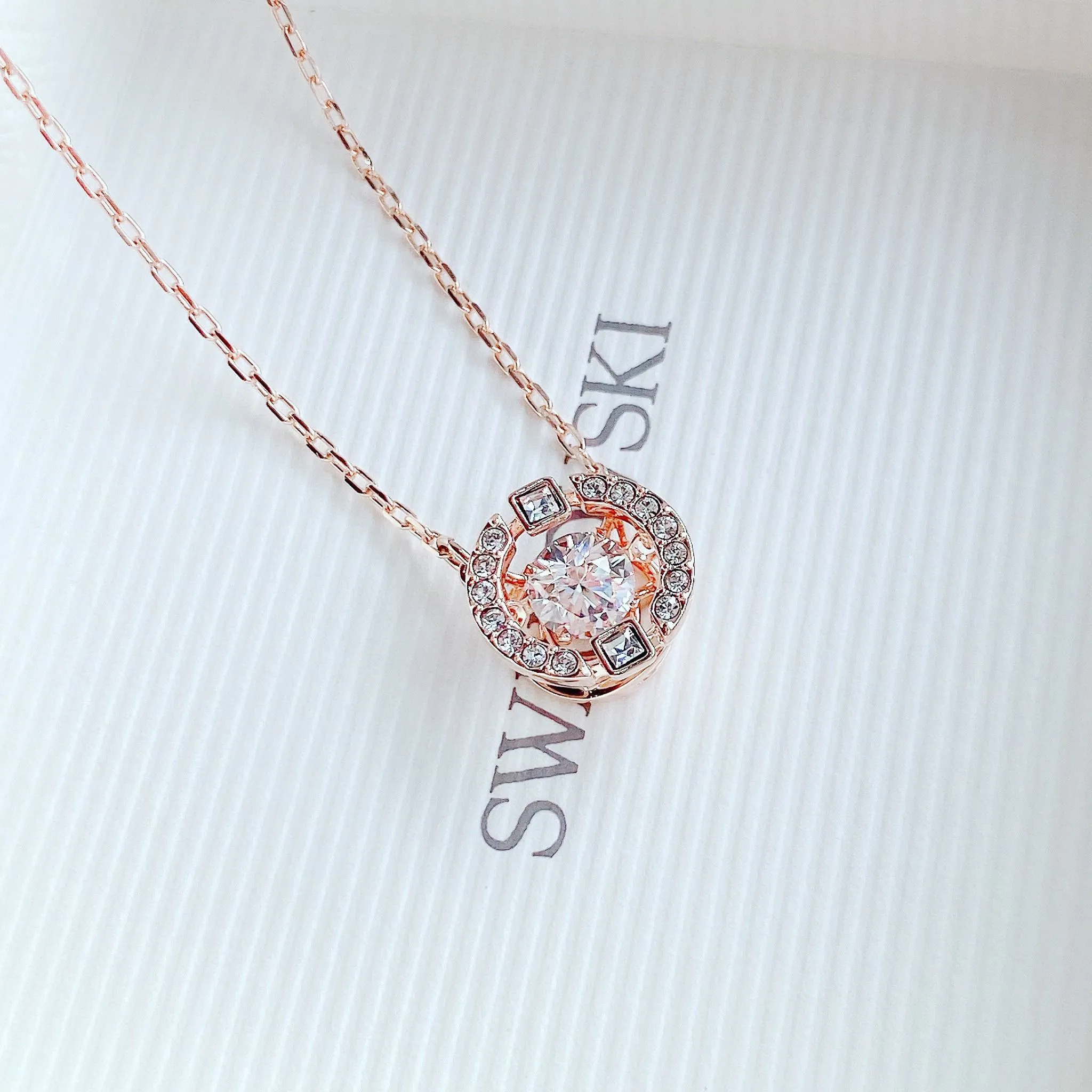 Dây chuyền Swarovski đá nhảy tròn màu vàng hồng - Swarovski Sparkling