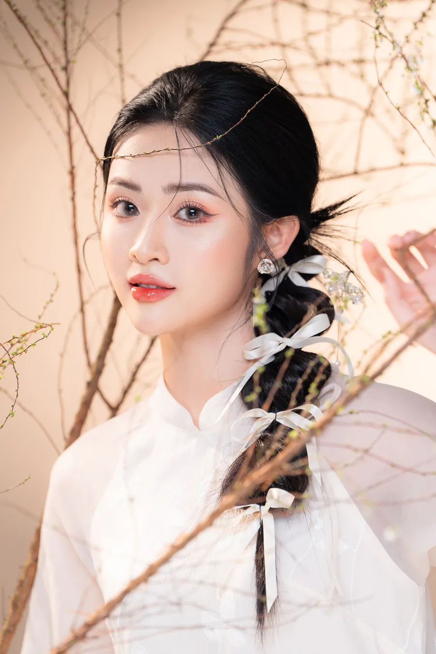 Top 14 kiểu búi tóc mặc áo dài Tết đẹp như nàng thơ