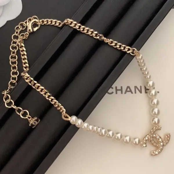 Dây Chuyền Nữ Chanel Necklace With Beautiful Symbol And White Pearl In Gold Tone Màu Trắng Vàng - Trang sức - Vua Hàng Hiệu