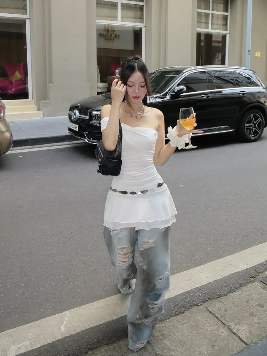 Sành điệu với kiểu phối váy ngoài quần Skants 