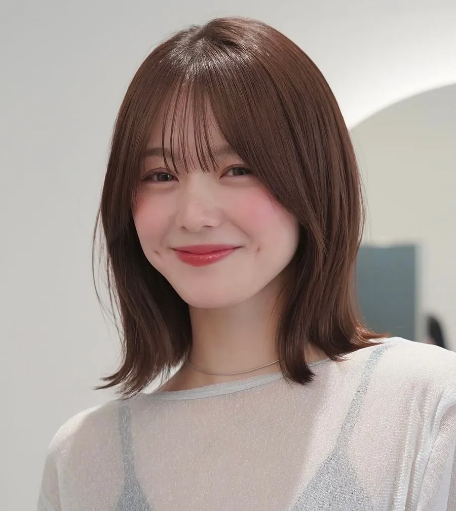 Tóc ngắn uốn vểnh đuôi