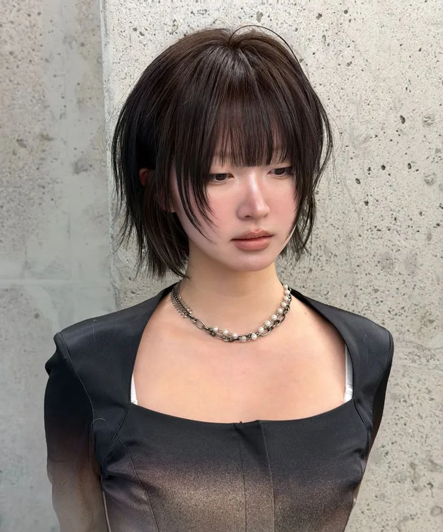 Mullet side part với đường cắt sắc nét