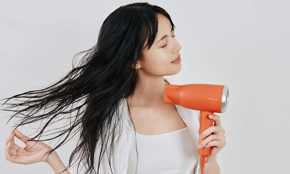 Máy sấy tóc ion âm có tác dụng gì? Có nên dùng không? - 1