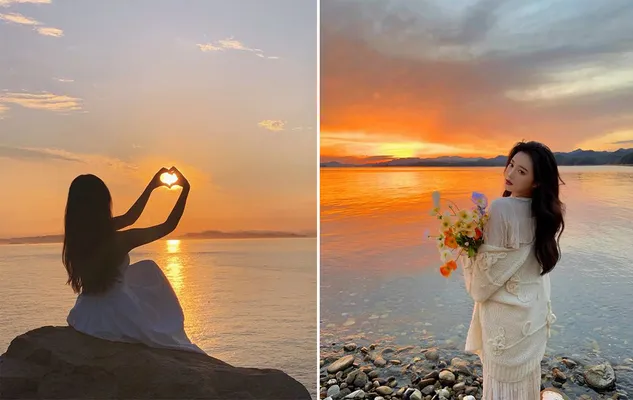 Tạo dáng chụp ảnh đưa tay lên cao